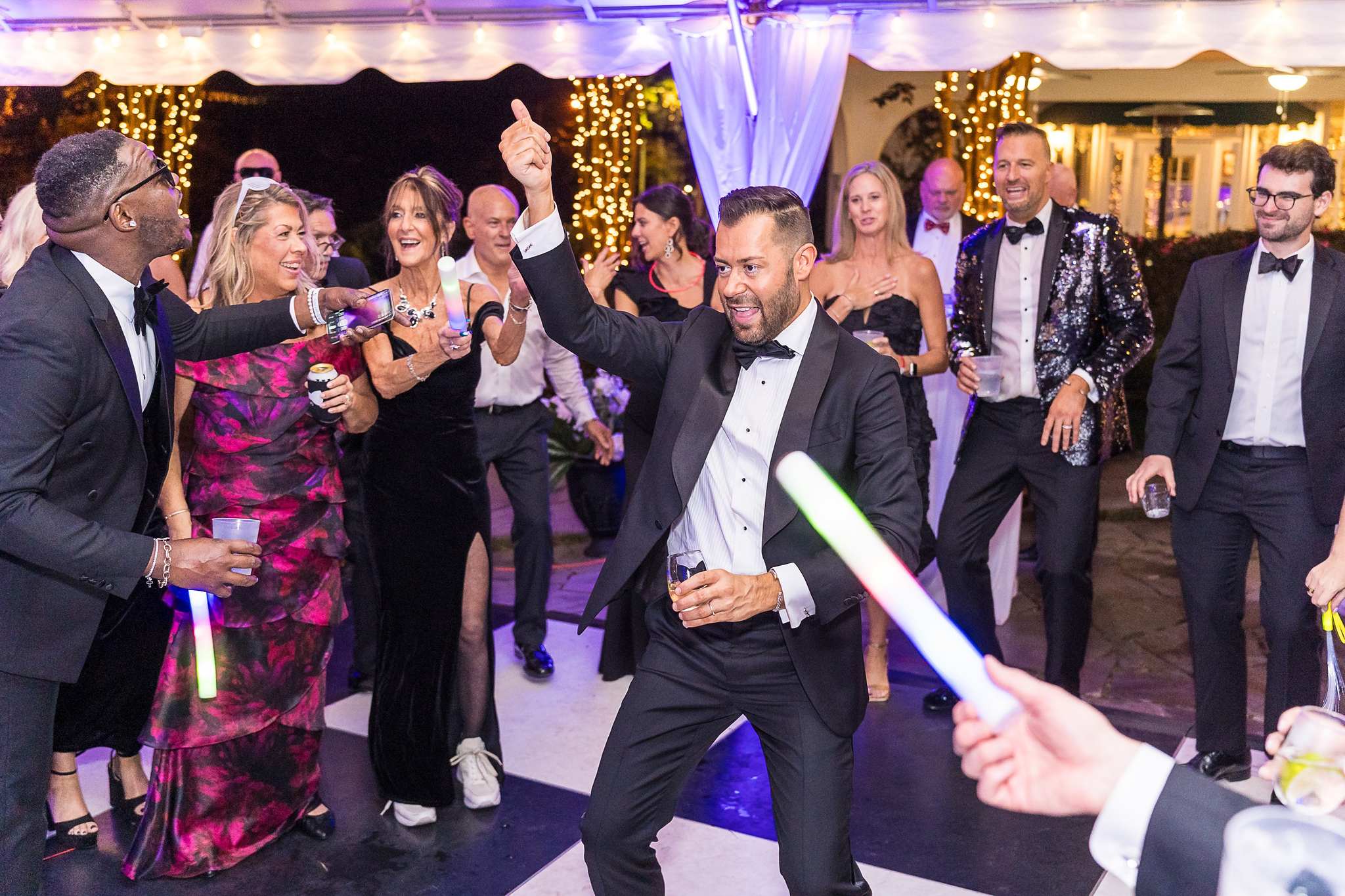 Guests dancing at a black tie wedding reception at The Cedars in Acworth
