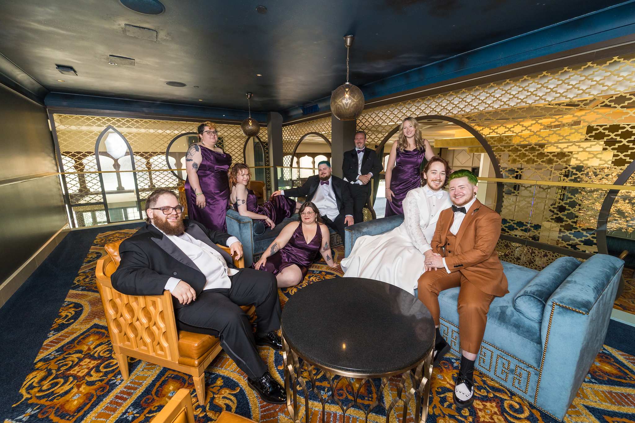 Wedding party relaxing in a Fox Theatre lounge
