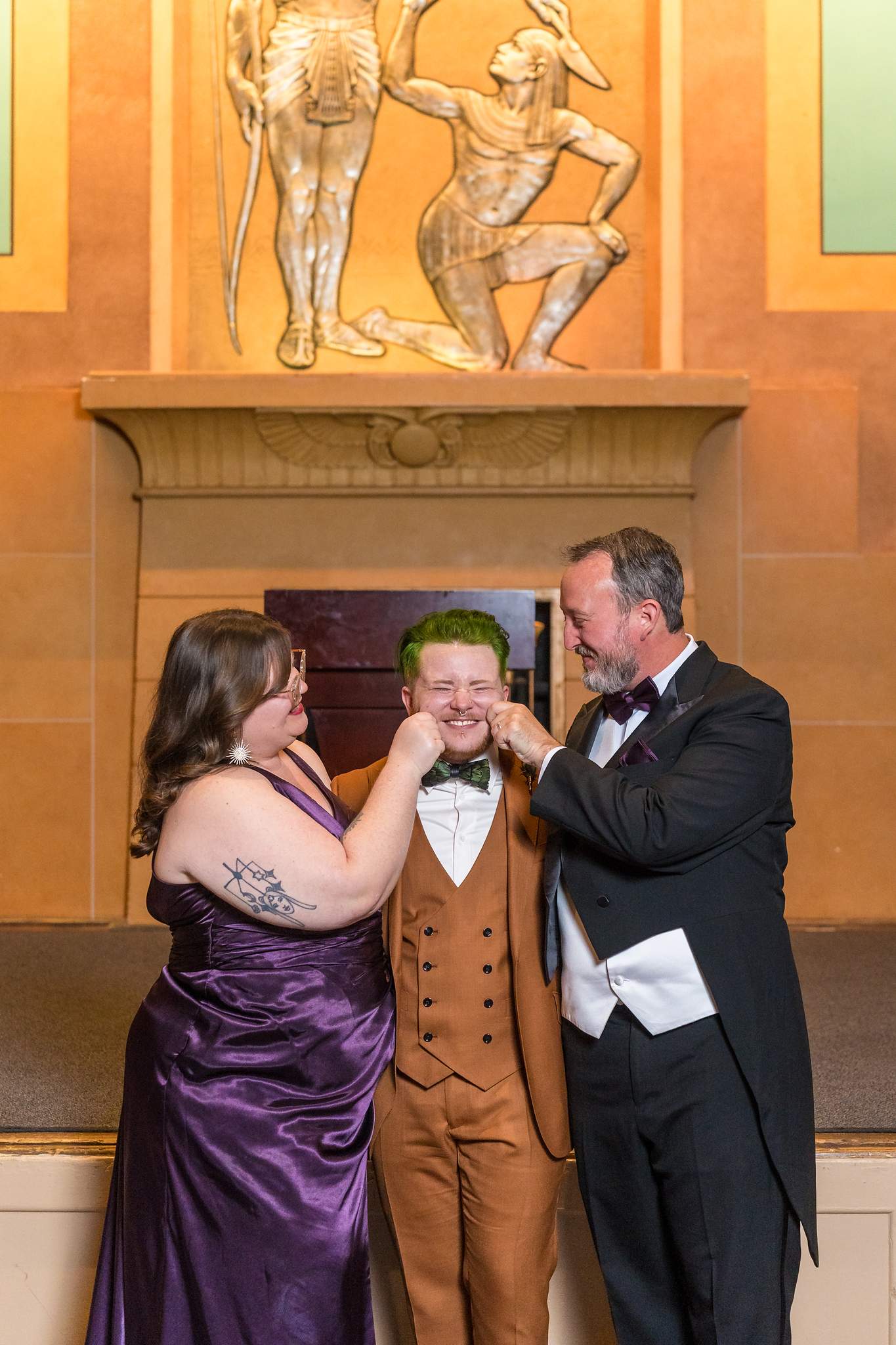 Guests sharing a joyful moment with the couple in the Egyptian Ballroom
